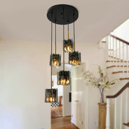 Modern 5-light cluster chandelier with smoke gray textured glass in a warm contemporary interior