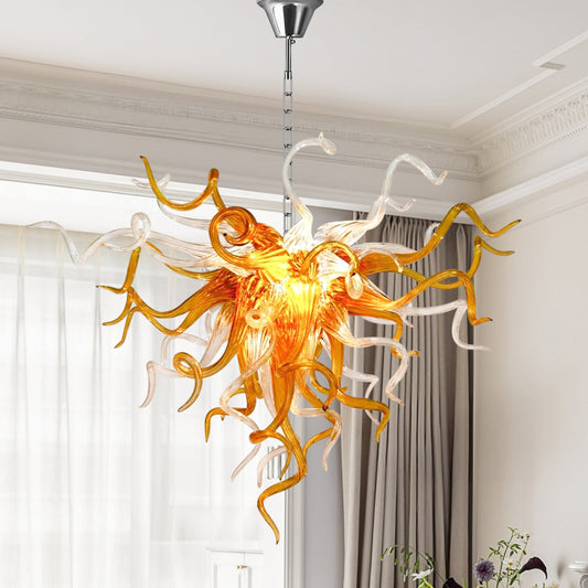 Amber Glow Chihuly style hand blown glass chandelier in bright room with white curtains.