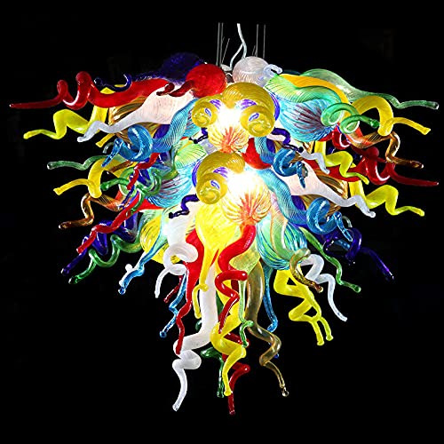 Close-up of a vibrant multi-color hand blown glass chandelier with bright lights against a dark background, showcasing detail.
