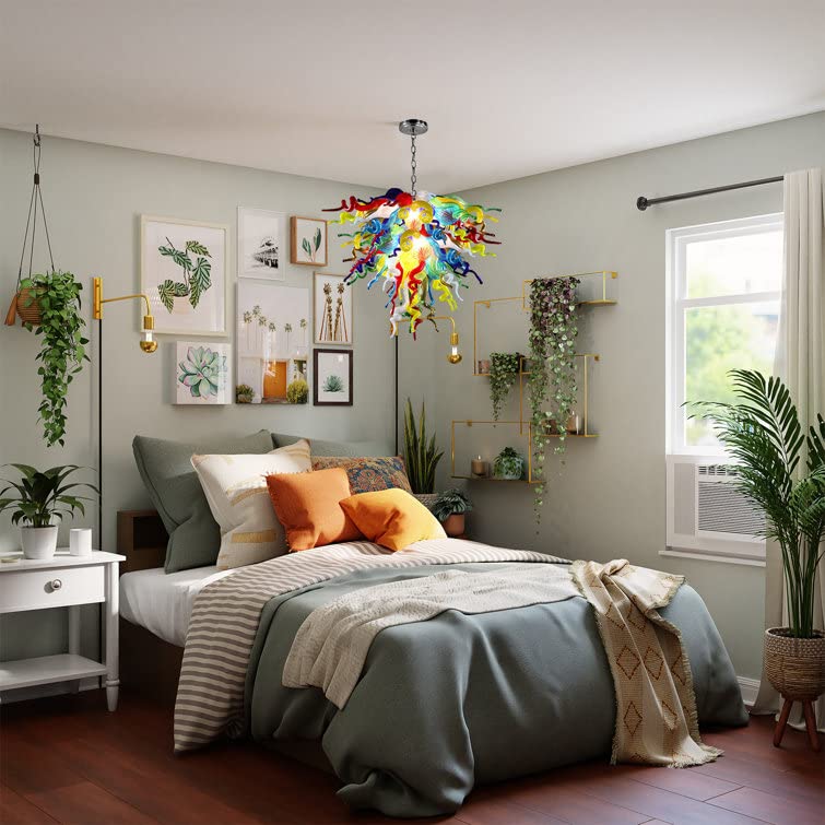 Vibrant multi-color hand blown glass chandelier as a whimsical centerpiece in a modern bedroom.