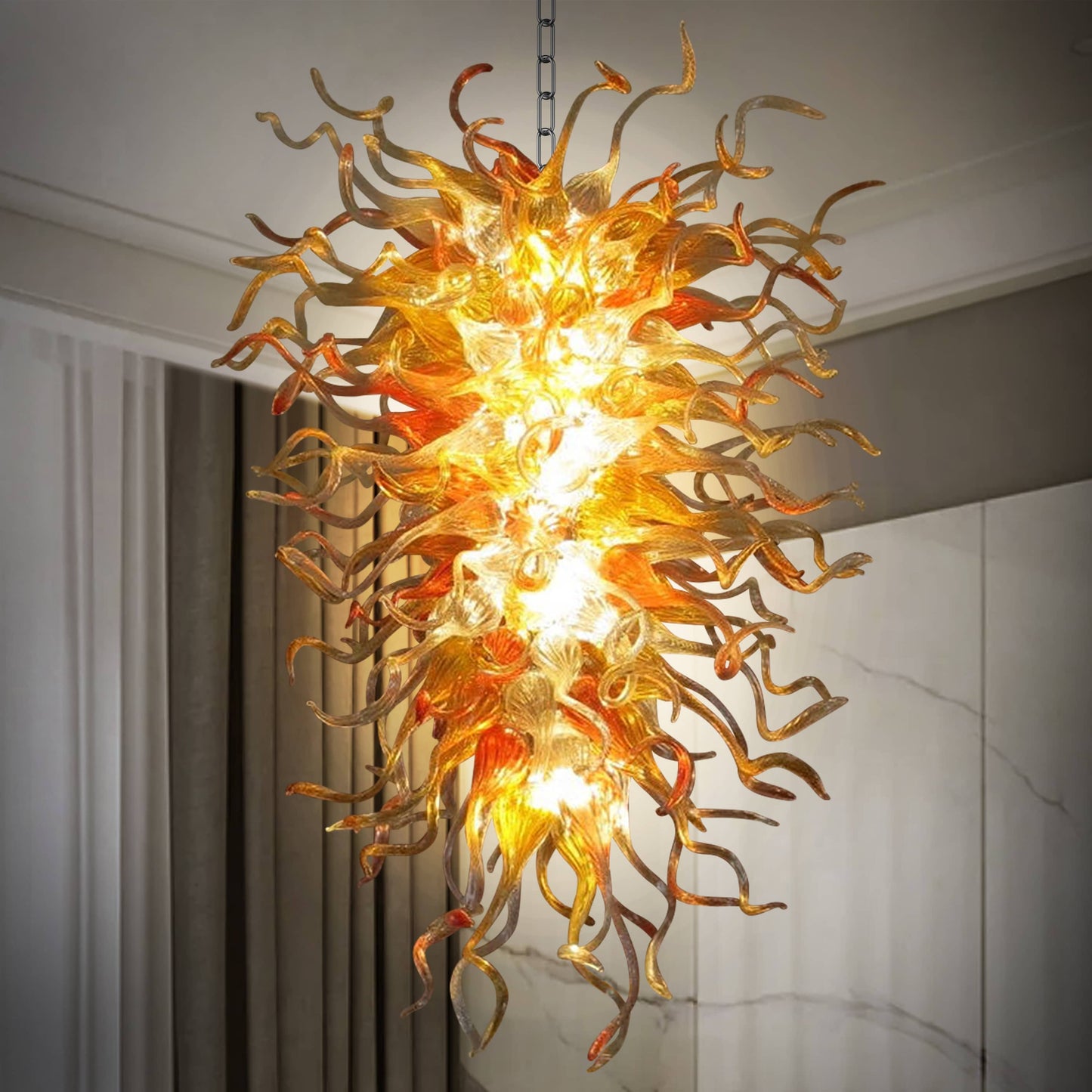 Artistic close-up of the glass overlapping, creating depth and a captivating interplay of light and shadow within the hand blown glass chandelier.