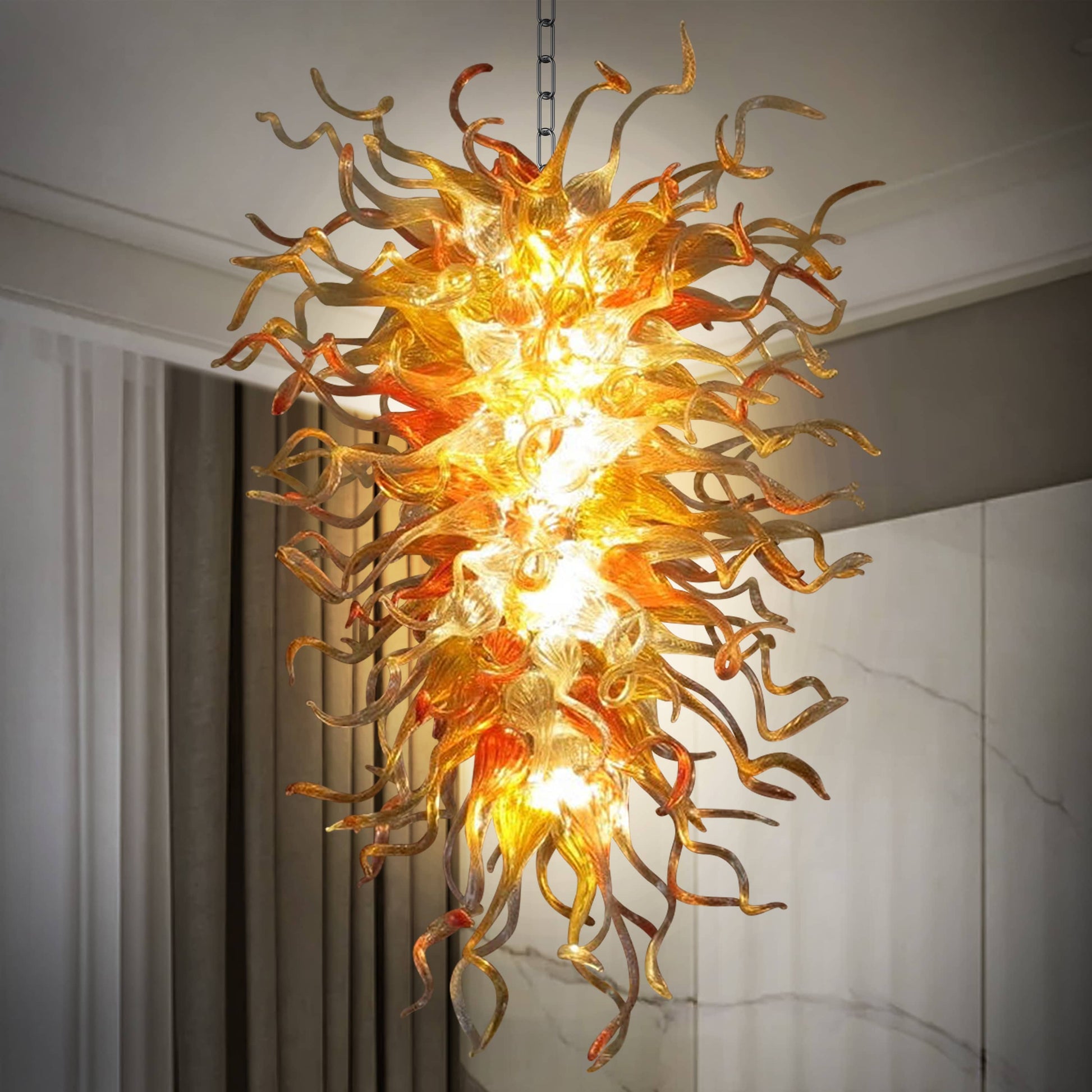 Artistic close-up of the glass overlapping, creating depth and a captivating interplay of light and shadow within the hand blown glass chandelier.