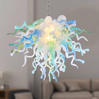 Colorful jellyfish-shaped Chihuly style blown glass chandelier in a living room setting