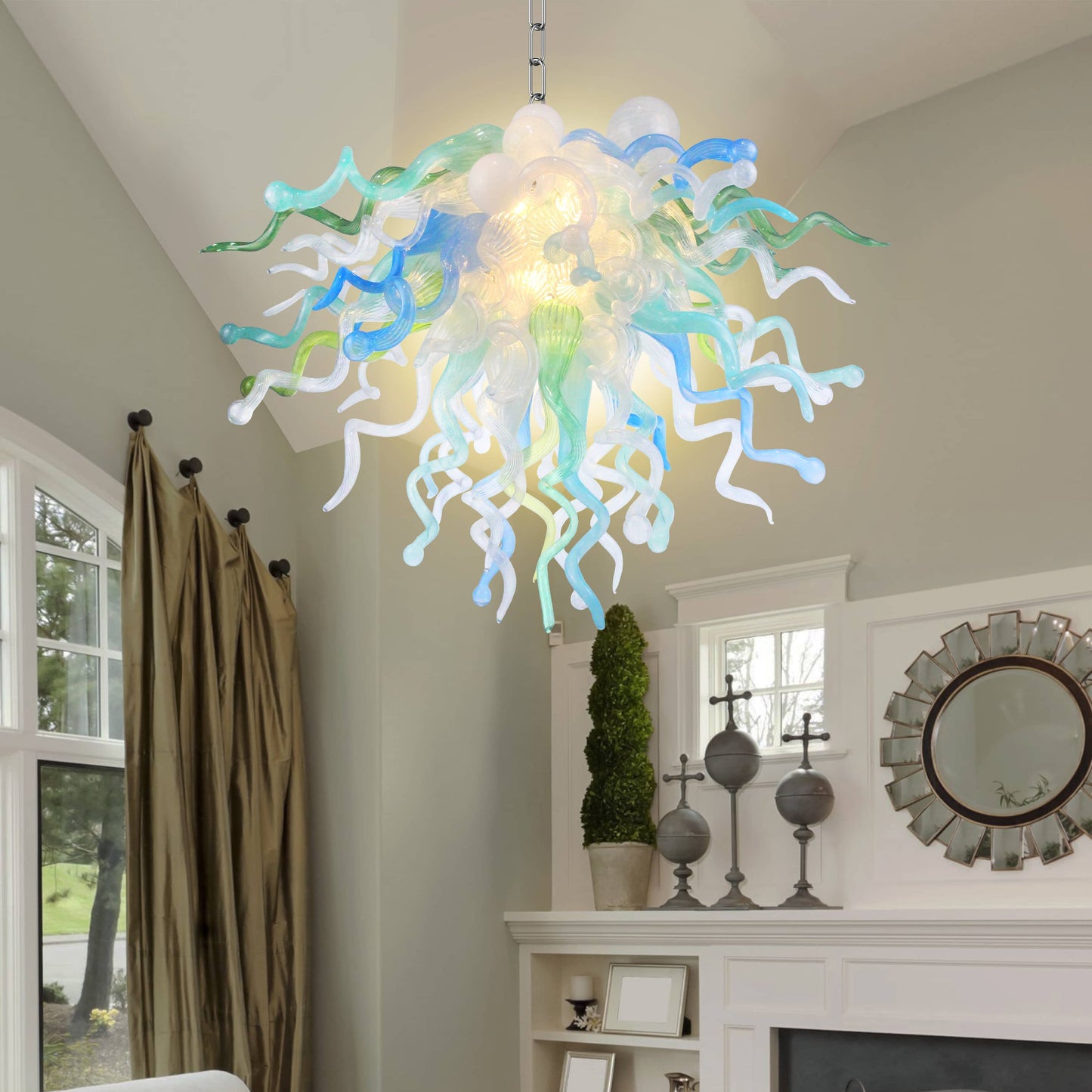 Colorful chandelier in Chihuly type hanging in a room with decor elements.