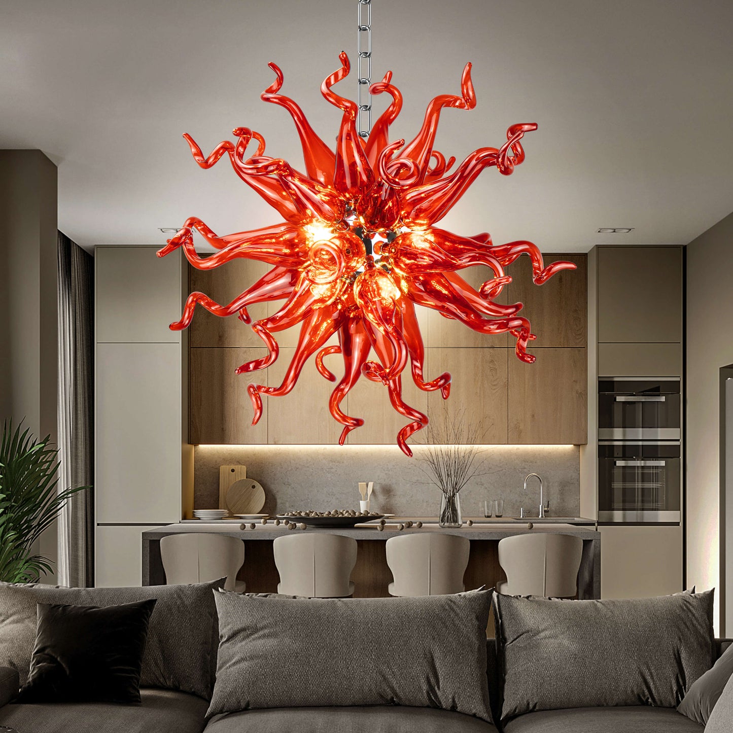 Fiery red hand blown glass chandelier with swirling tendrils, a modern lighting design.