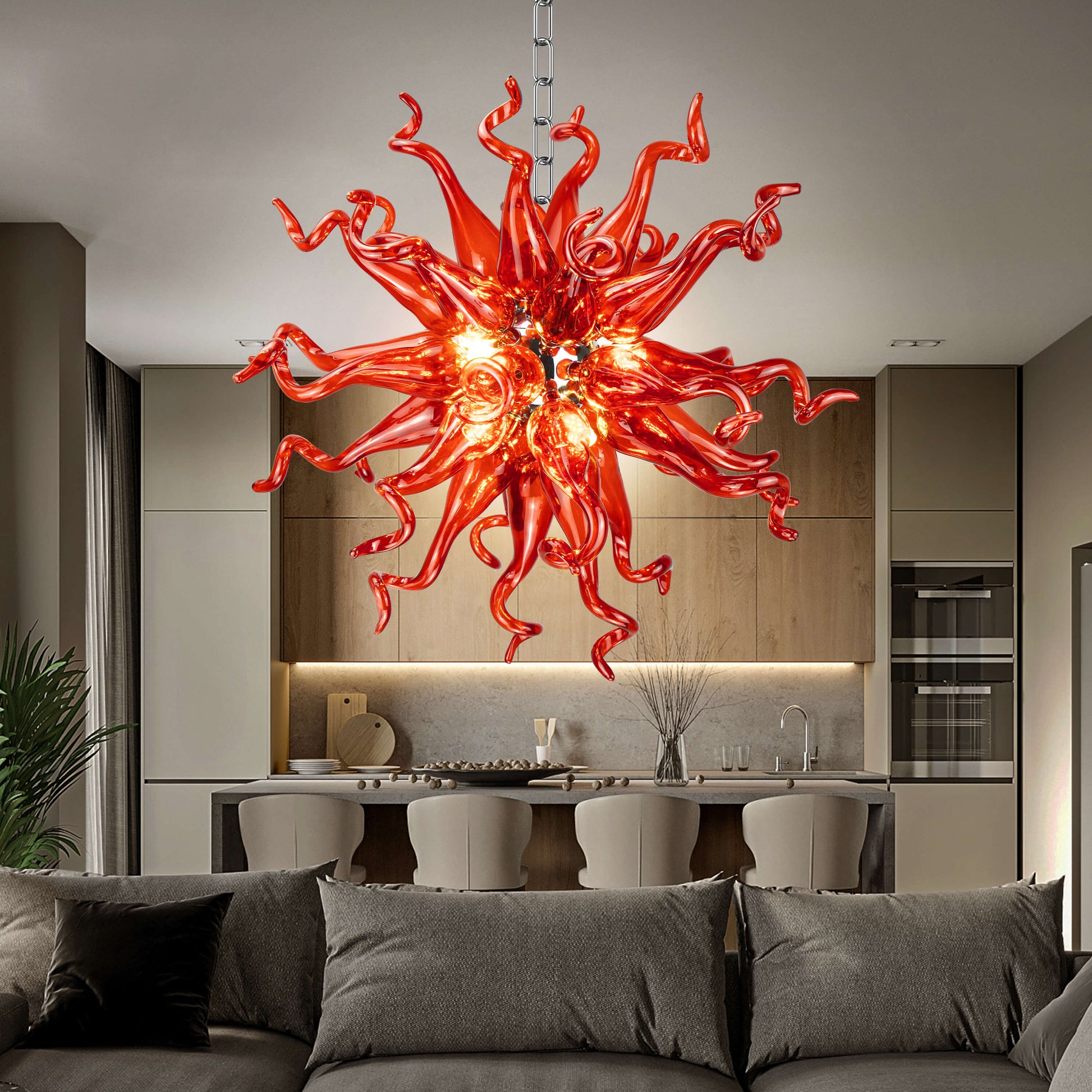 Fiery red hand blown glass chandelier with swirling tendrils, a modern lighting design.