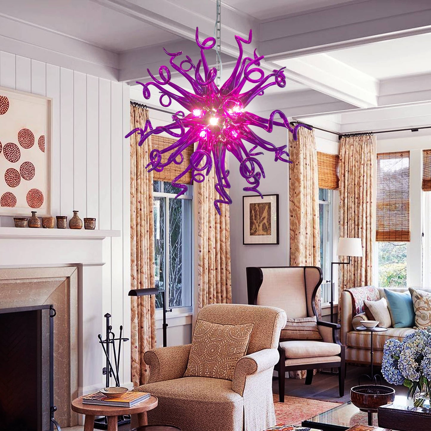 Luxurious purple blown glass chandelier illuminating a chic, traditional-meets-modern living space.