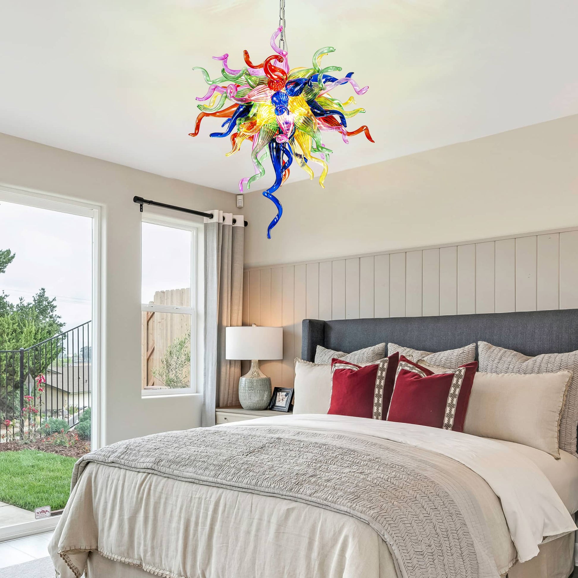 Chihuly style glass chandelier, showcasing its unique design and vibrant spectrum of colors.