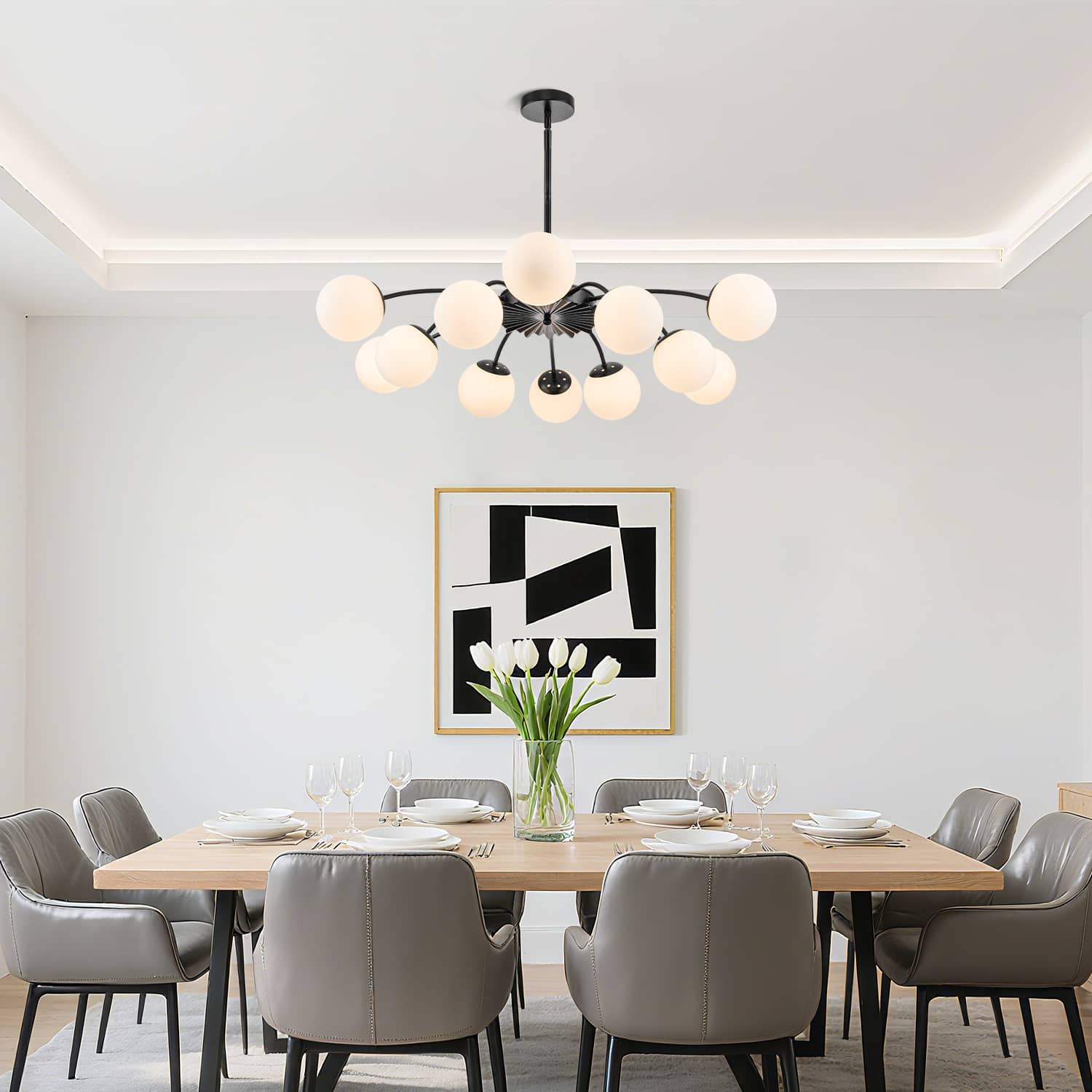 12-Light black bubble globe chandelier with frosted glass shades in minimalist dining room with wooden table.