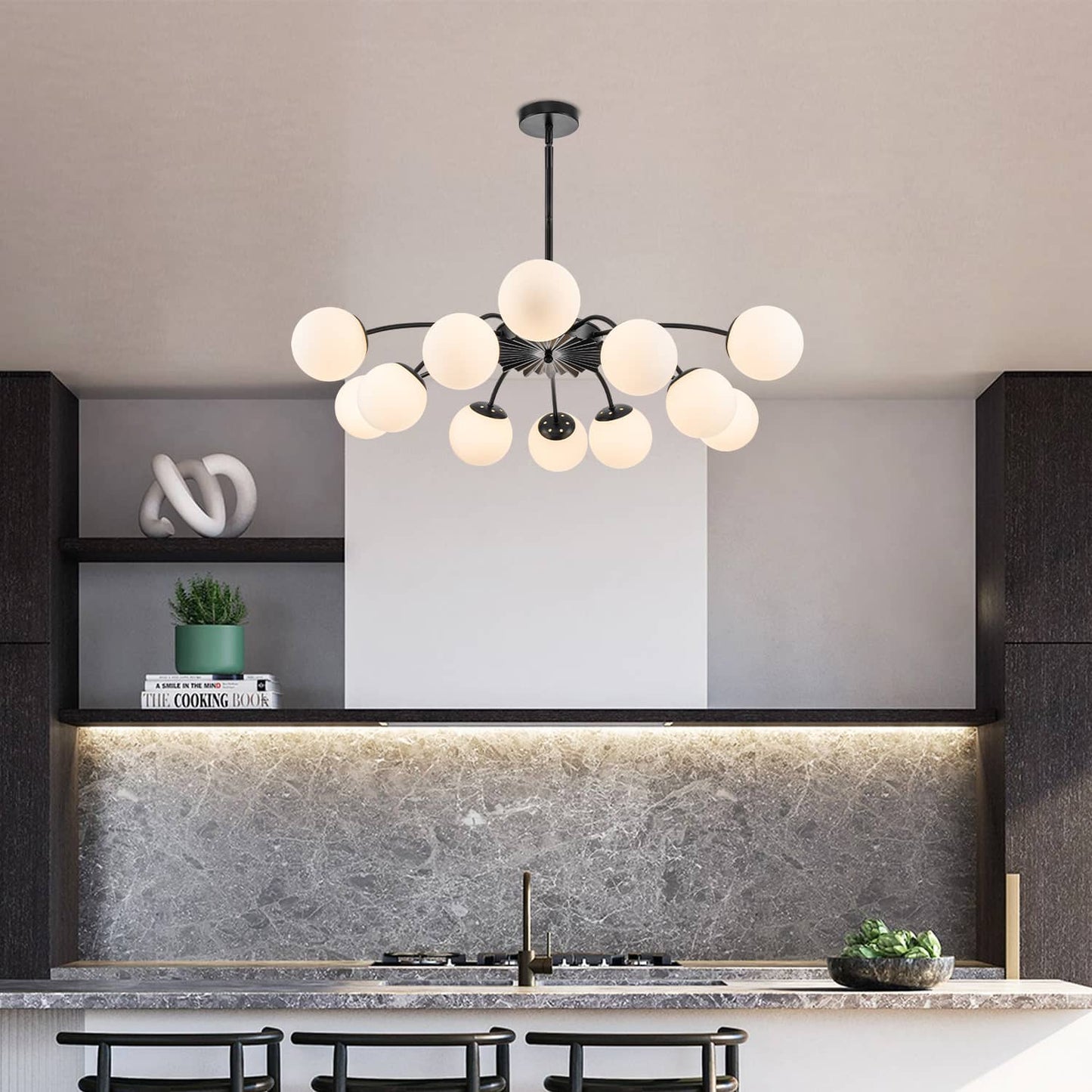 12-Light frosted glass pendant black bubble globe chandelier in modern kitchen with marble backsplash.