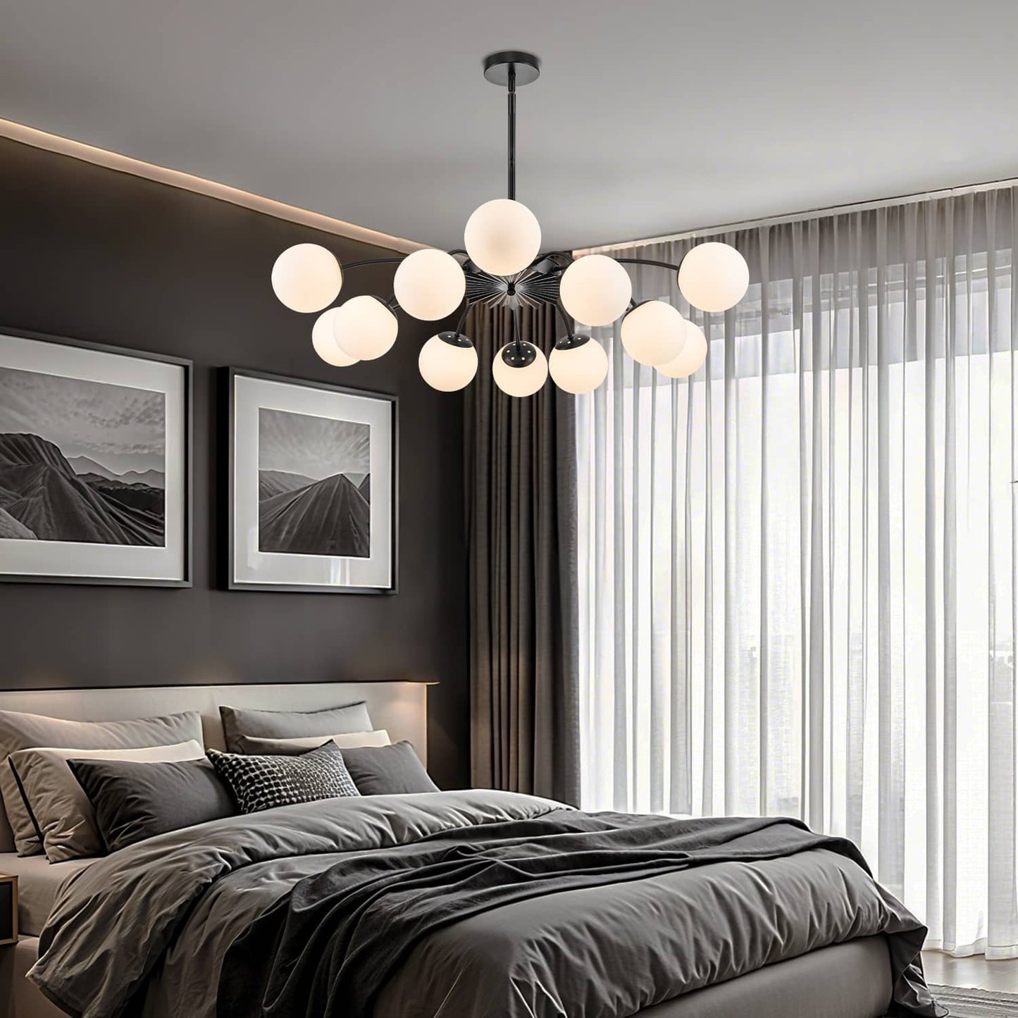 Warm-lit black 12-light frosted glass pendant bubble globe chandelier above dark-toned bedroom.