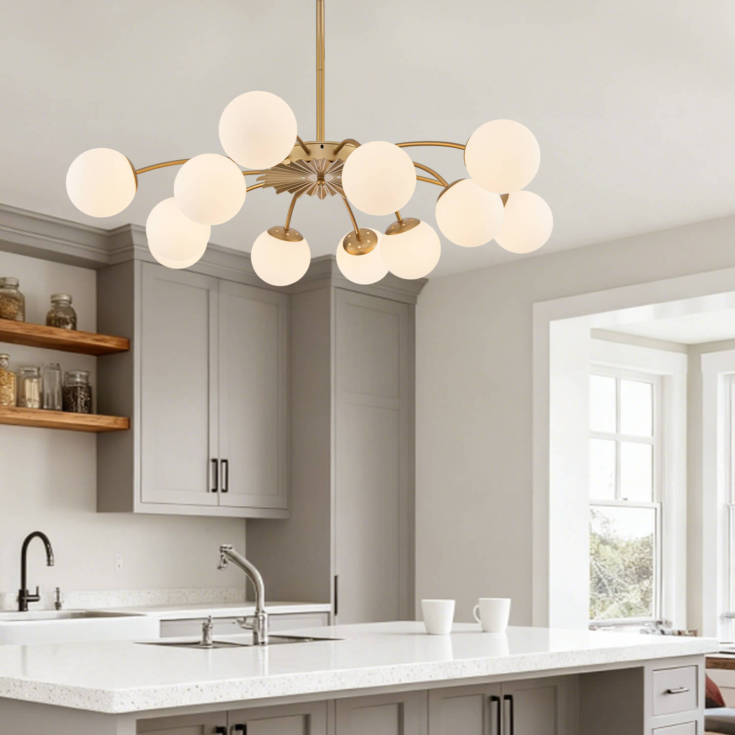 12-Light frosted glass bubble gold pendant chandelier hanging over a minimalist white kitchen island.