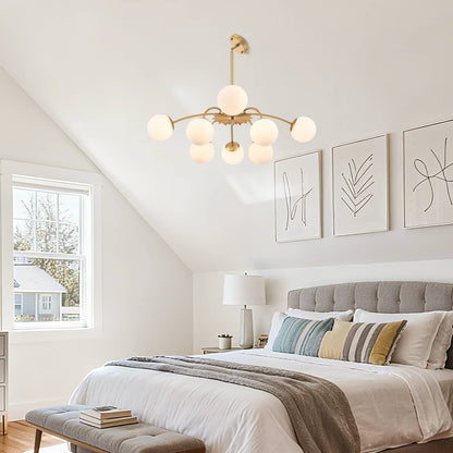 Demonstrating the frosted glass bubble Hanging Globe chandelier mounted on a slanted ceiling in a bedroom.