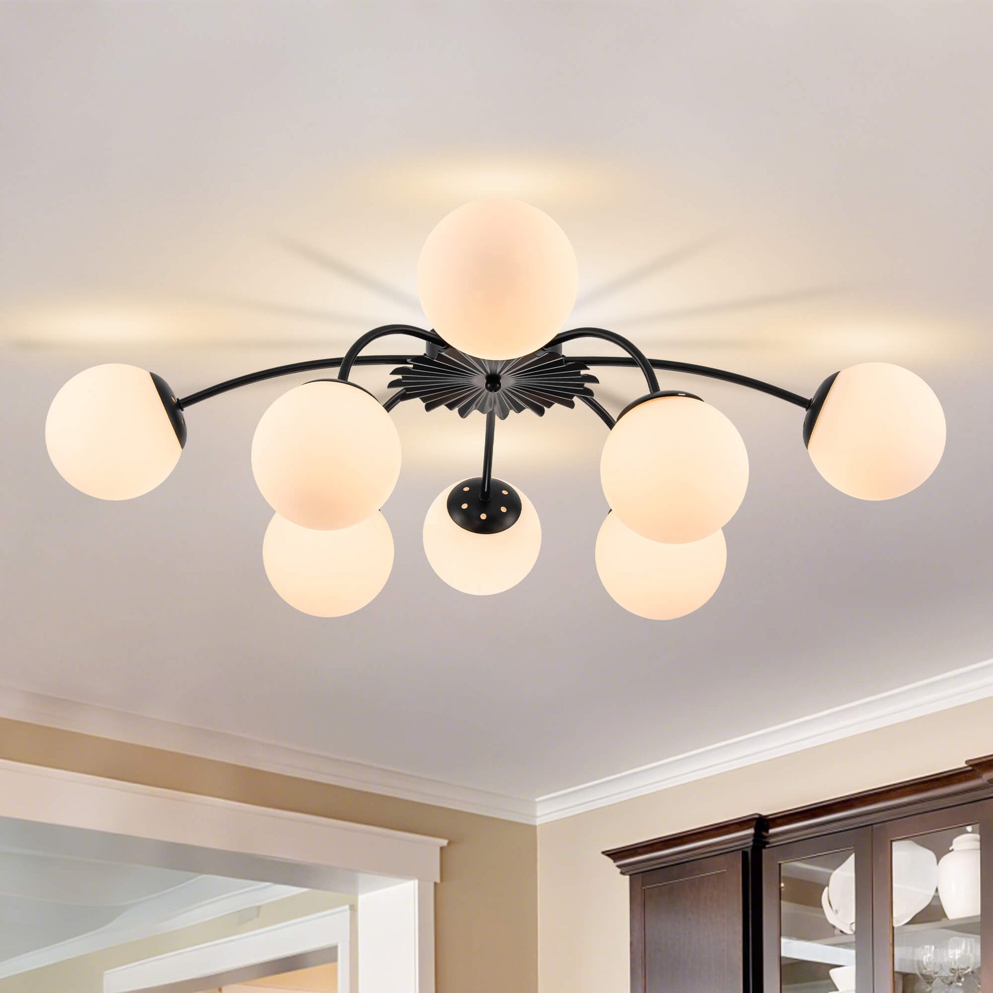 8-Light black frosted globe semi-flush mount ceiling light in modern kitchen.