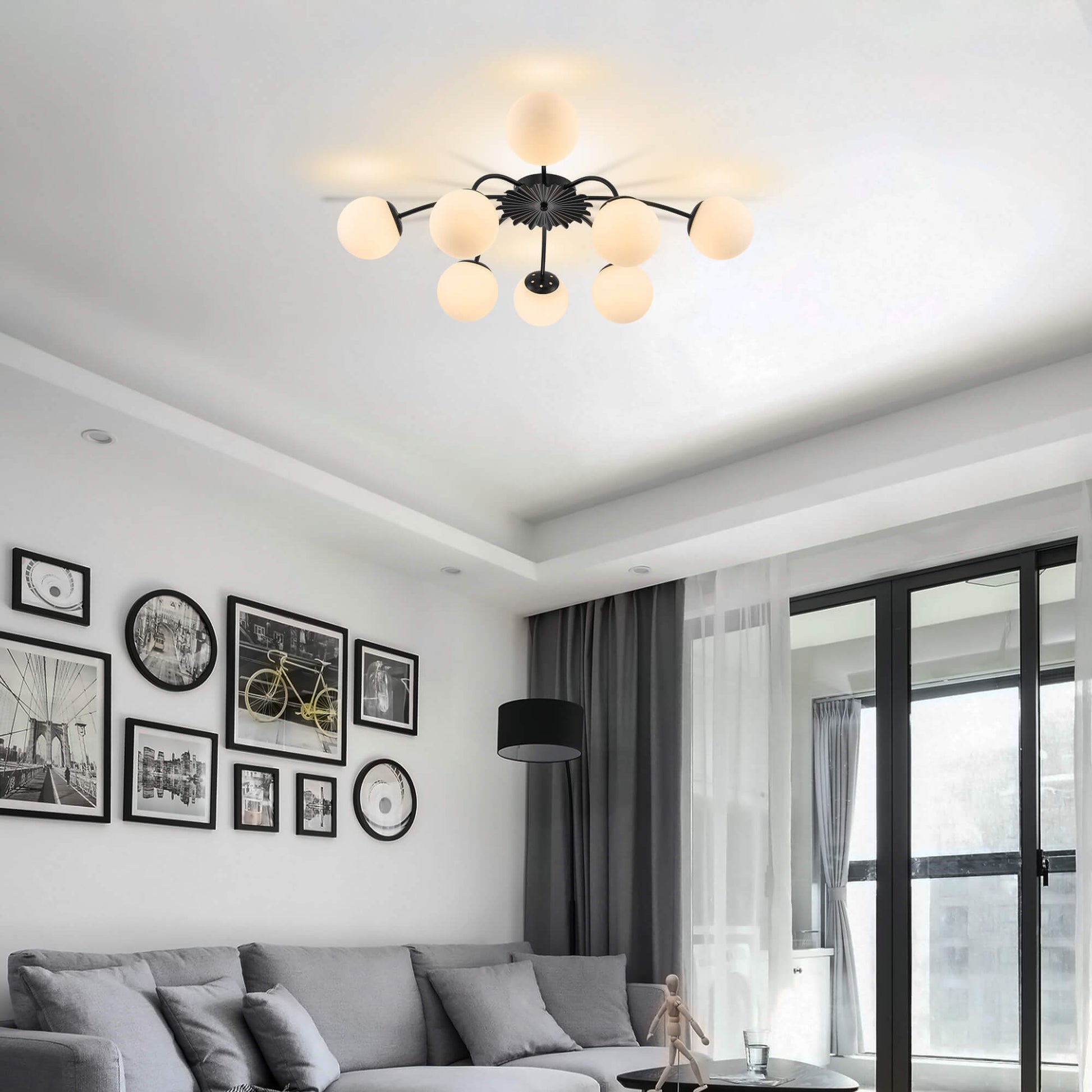 8-Light black ball semi-flush mount ceiling light in modern living room with dark curtains.