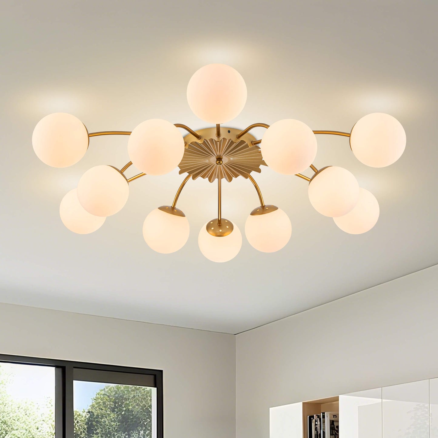 Detail shot of the gold semi-flush mount ceiling light featuring twelve frosted glass globes.