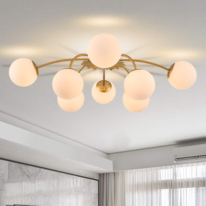 8-Light modern bubble gold ceiling light with frosted globes.