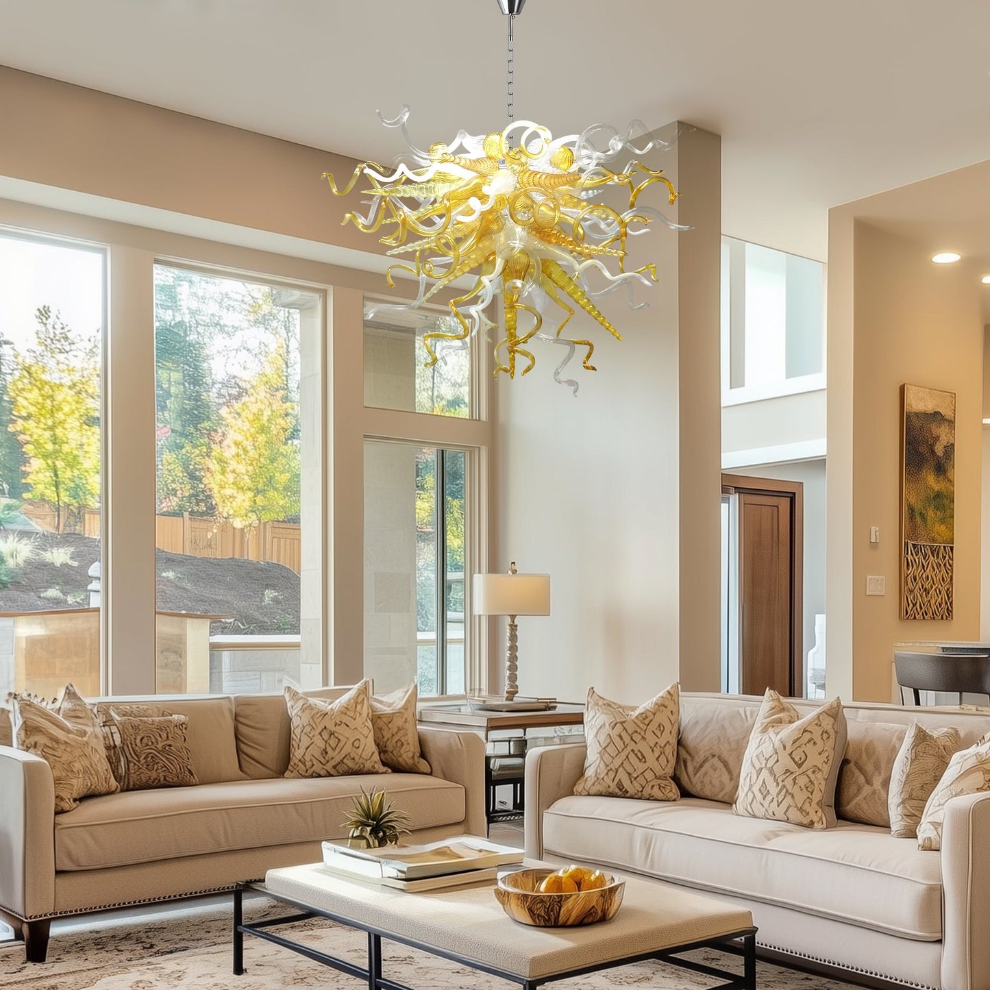 Amber and clear Chihuly-style hand blown murano glass chandelier in a light-filled living room.
