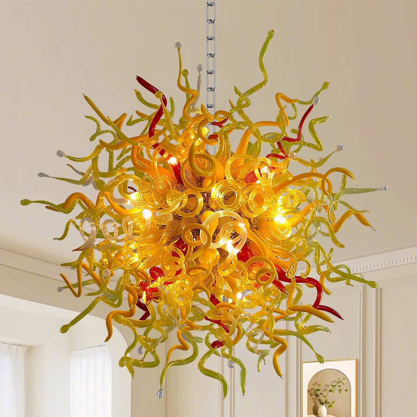 Oversized Chihuly style blown murano glass chandelier in golden, yellow and red.