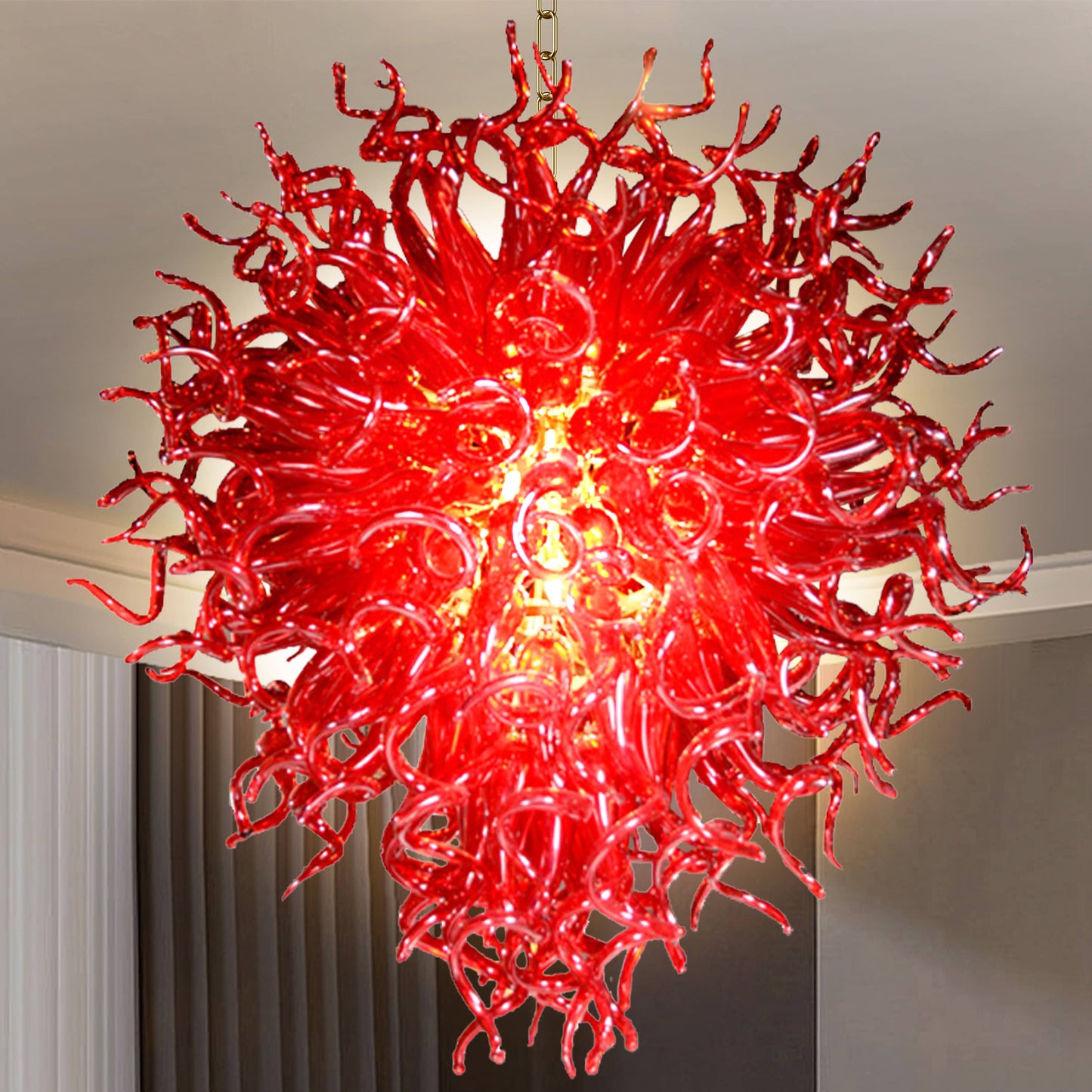 Detailed view of the rich red hues and complex textures within the artistic hand blown glass chandelier's design.