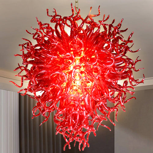 Detailed view of the rich red hues and complex textures within the artistic hand blown glass chandelier's design.