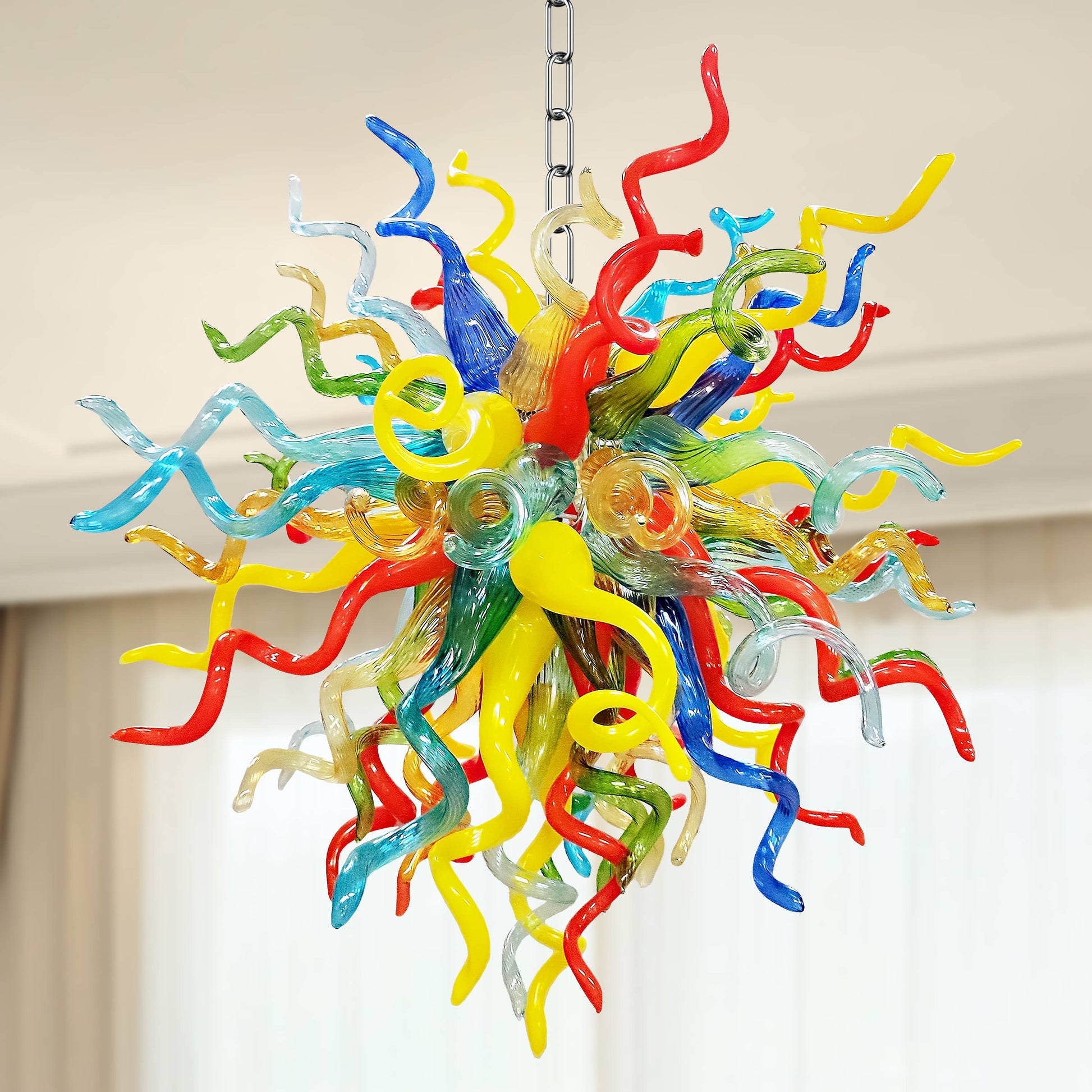Colorful glass chandelier with multicolored arms hanging from the ceiling
