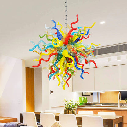 Colorful glass chandelier in Chihuly type hanging in a modern kitchen