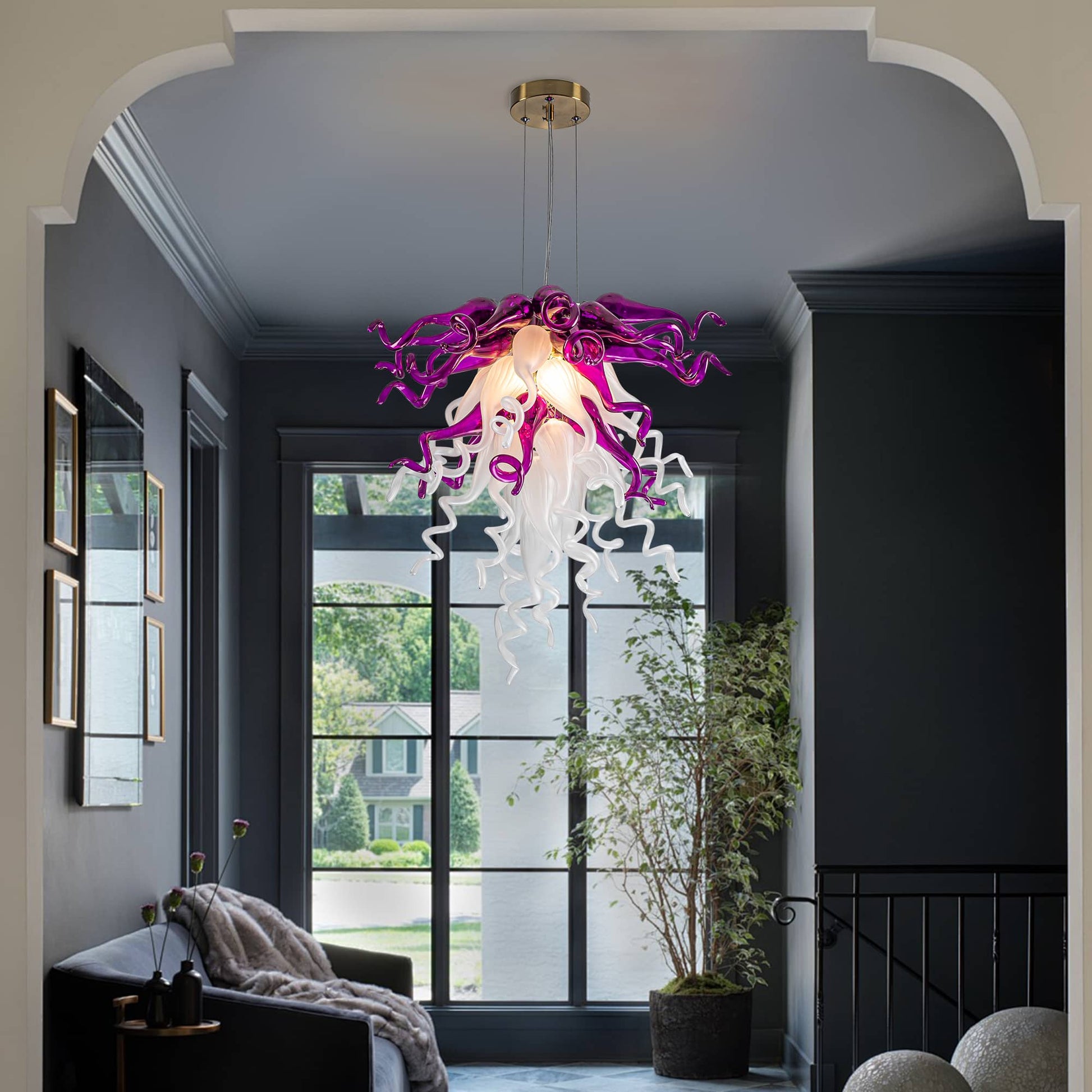 Modern chandelier with purple and white design in a stylish interior setting.