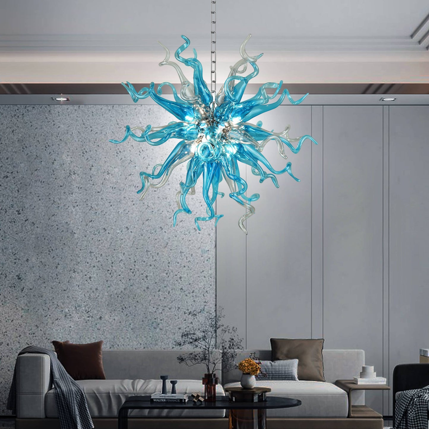 Modern living room with a Chihuly style blue blown glass chandelier in sputinik shape