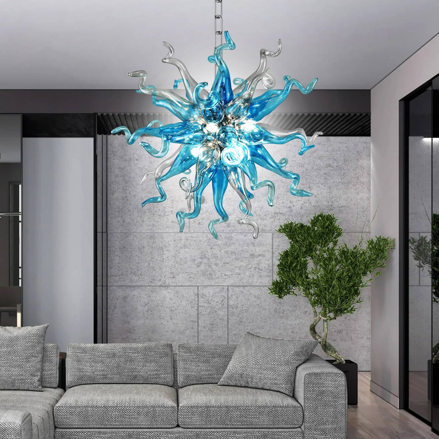 Blue and gray sputnik blown glass chandelier hanging above a gray sofa in a modern living room.