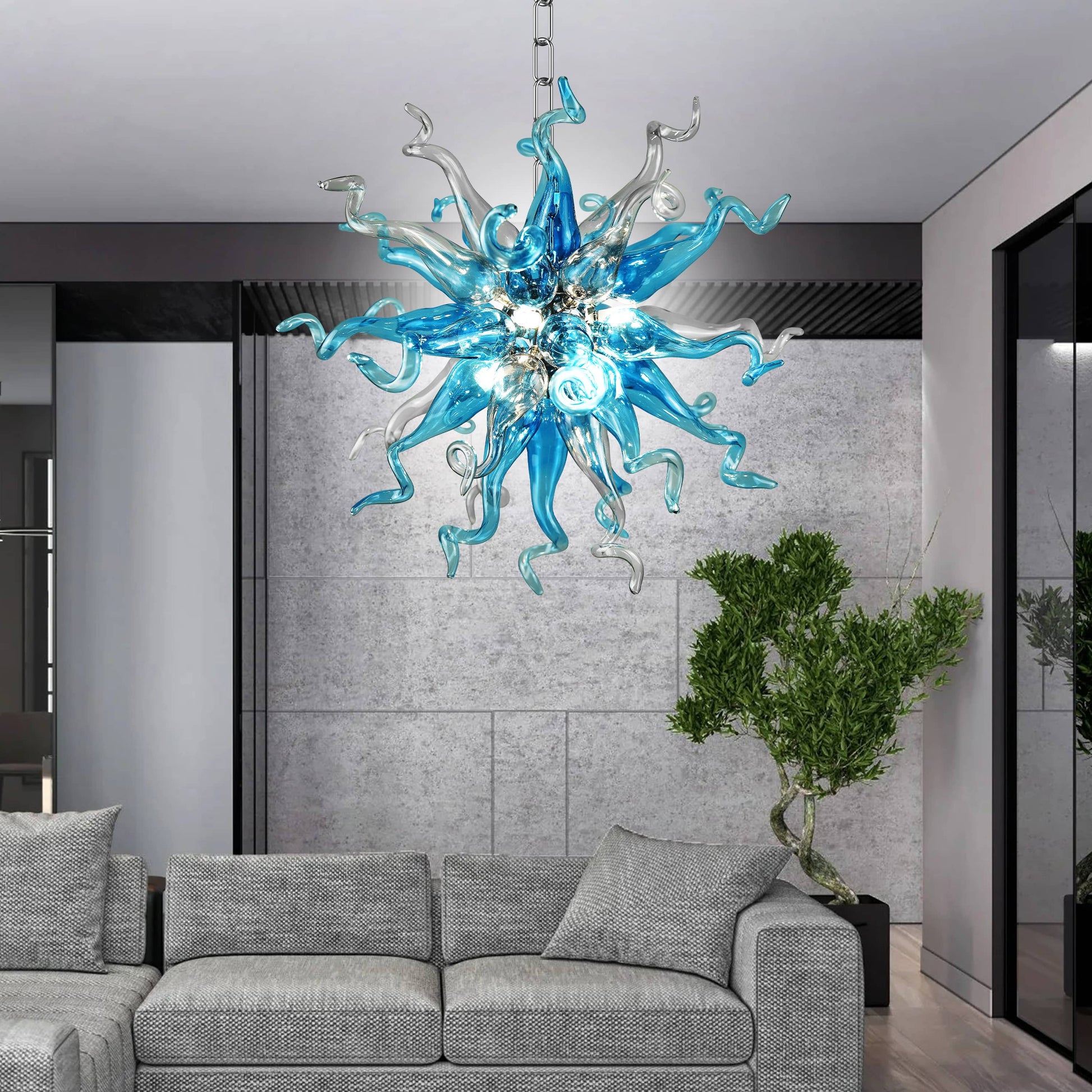 Blue and gray sputnik blown glass chandelier hanging above a gray sofa in a modern living room.