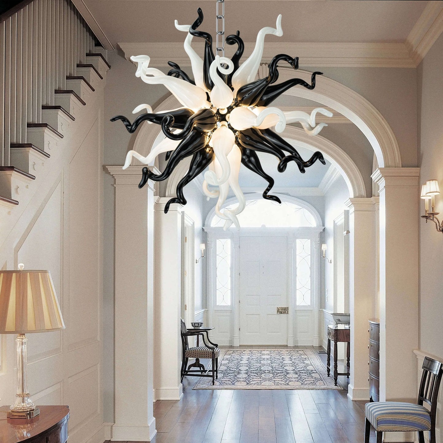 Black & White Burst chandelier with blown glass artistry, creating a bold and contemporary focal point for any room.