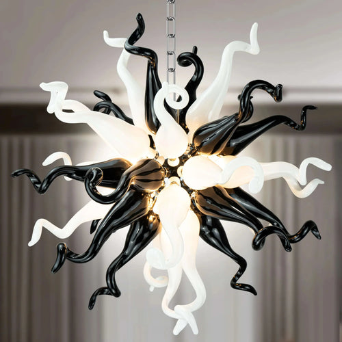 Blown glass chandelier in Black & White Burst, offering a dynamic contrast of black and white for modern interiors.